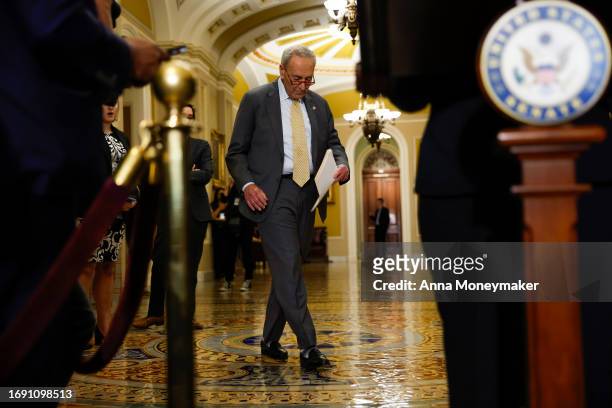 Senate Majority Leader Chuck Schumer walks back to the podium during a news conference following the weekly Senate Democratic policy luncheon meeting...