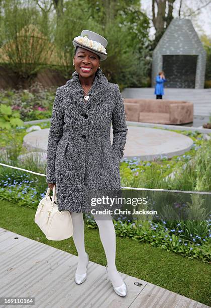 Floella Benjamin poses in the B&Q Sentebale 'Forget-Me-Not' Garden at the Chelsea Flower Show at Royal Hospital Chelsea on May 20, 2013 in London,...