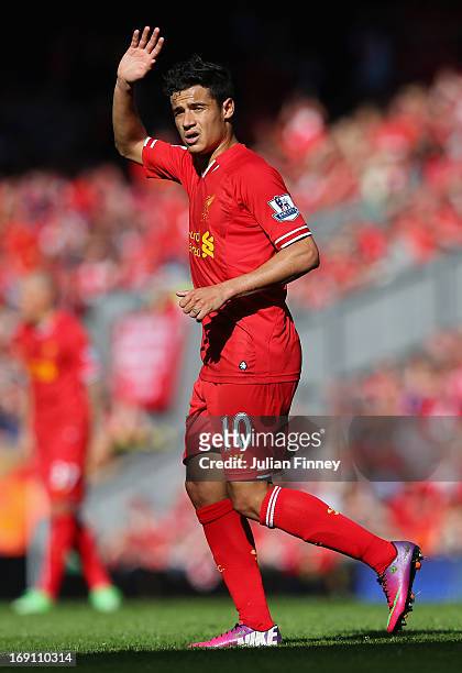 Coutinho of Liverpool waves to the crowd during the Barclays Premier League match between Liverpool and Queens Park Rangers at Anfield on May 19,...