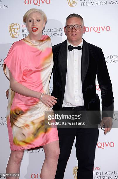 Gwendoline Christie and Gilles Deacon pose in the press room at the Arqiva British Academy Television Awards 2013 at the Royal Festival Hall on May...