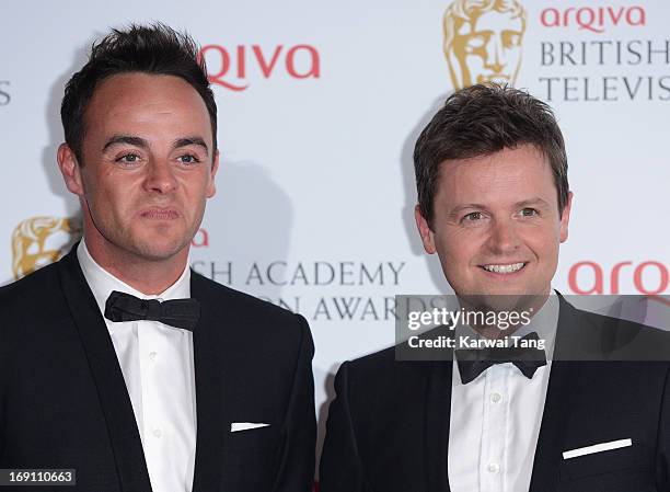 Anthony McPartlin and Declan Donnelly pose in the press room at the Arqiva British Academy Television Awards 2013 at the Royal Festival Hall on May...