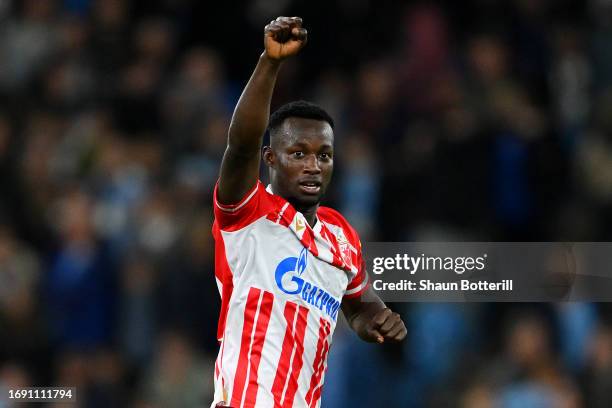 Osman Bukari of FK Crvena zvezda celebrates after scoring the team's first goal during the UEFA Champions League Group G match between Manchester...