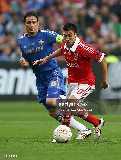 Frank Lampard of Chelsea vies with Nicolas Gaitan of SL Benfica during the Europa League Final match between Chelsea and SL Benfica at The Amsterdam...