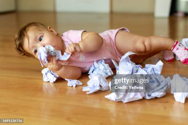 Paper Eating Community 125 Baby Eating Paper Stock Photos, High-Res Pictures, and Images ...