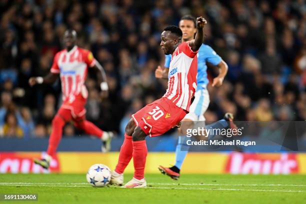 Osman Bukari of FK Crvena zvezda scores the team's first goal during the UEFA Champions League Group G match between Manchester City and FK Crvena...