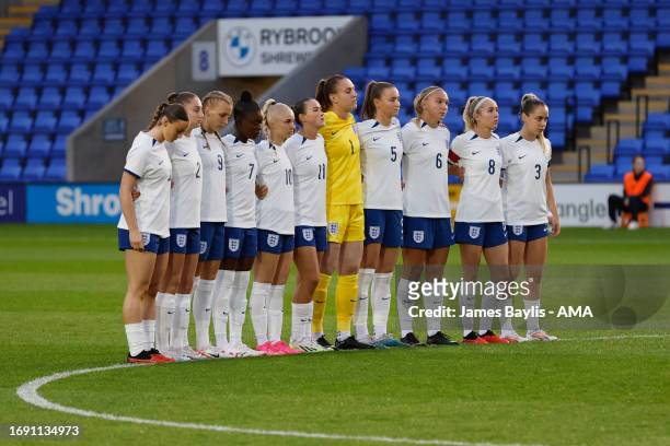 Players of England observe a minute of silence in tribute to Maddy Cusack before the Women's International Friendly between England Women U23 and...