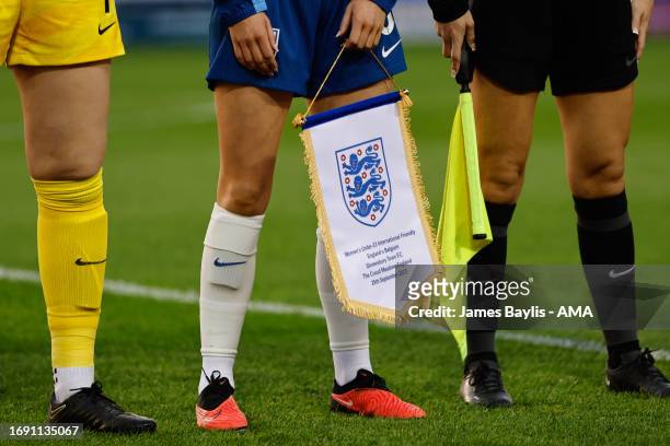 England captain Missy Bo Kearns holds a matchday pennant before the Women's International Friendly between England Women U23 and Belgium U23 at The...