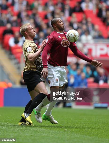 Clive Platt of Northampton Town controls the ball under pressure from Andrew Davies of Bradford City during the npower League Two Play Off Final...