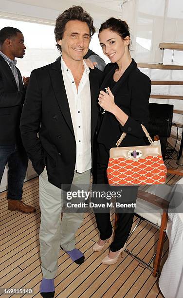 Lawrence Bender and Paz Vega attend a lunch hosted by Len Blavatnik, Harvey Weinstein and Warner Music during the 66th Cannes Film Festival on board...