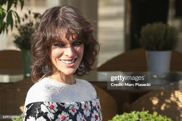 Actress and model Milla Jovovich is seen leaving the 'Grand Hyatt Hotel Martinez Cannes' during the 66th Annual Cannes Film Festival on May 20, 2013...