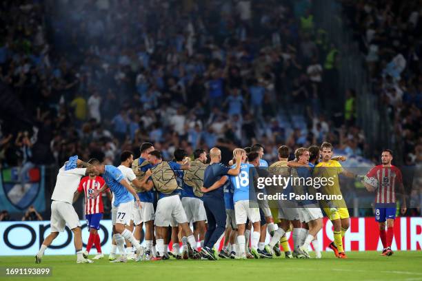 Ivan Provedel of Lazio celebrates victory with teammates at full-time following the UEFA Champions League Group E match between SS Lazio and Atletico...