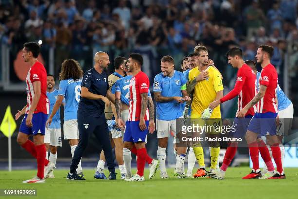 Ivan Provedel of Lazio celebrates victory with teammates at full-time following the UEFA Champions League Group E match between SS Lazio and Atletico...