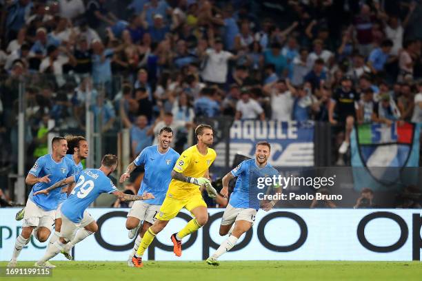 Ivan Provedel of Lazio celebrates with teammates after scoring the team's first goal to equalise during the UEFA Champions League Group E match...