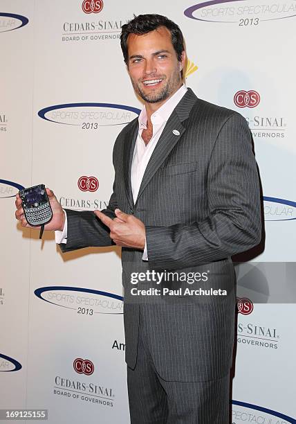 Actor Scott Elrod attends the 28th Annual Sports Spectacular Anniversary Gala at the Hyatt Regency Century Plaza on May 19, 2013 in Century City,...