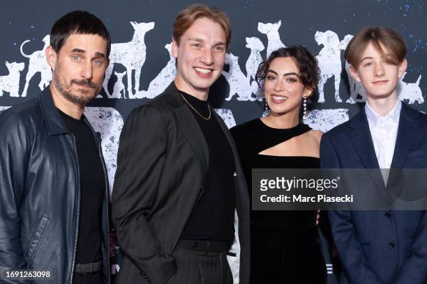 Clemens Schick, Alexander Settineri, Grace Palma and Lincoln Powell attend the "Dogman" premiere at Cinema UGC Normandie on September 19, 2023 in...