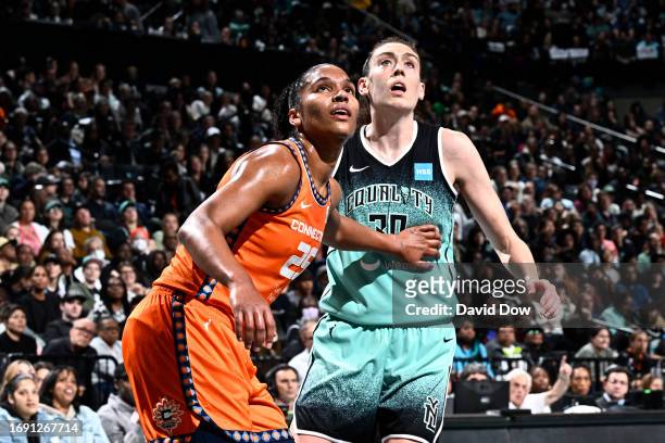 Alyssa Thomas of the Connecticut Sun attempt to rebound the ball during the game against Breanna Stewart of the New York Liberty during round two...