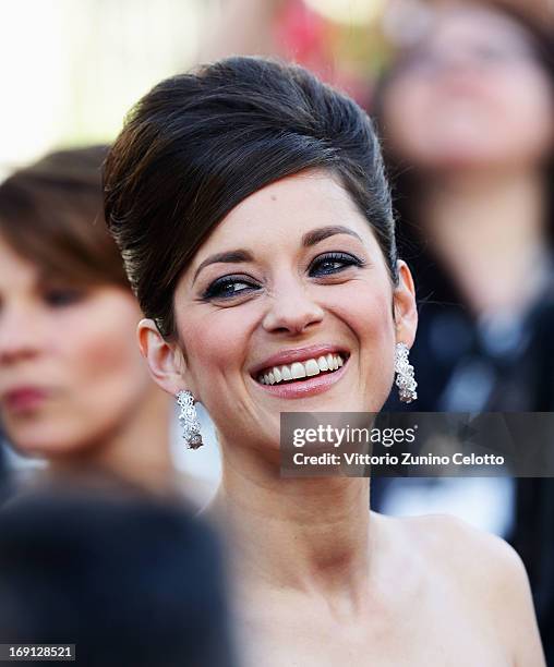 Marion Cotillard attends the 'Blood Ties' Premiere during the 66th Annual Cannes Film Festival at the Palais des Festivals on May 20, 2013 in Cannes,...