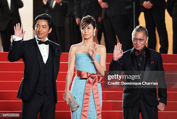 Takao Osawa, Nanako Matsushima, and Takashi Miike attend the Premiere of 'Wara No Tate' during the 66th Annual Cannes Film Festival at the Palais des...