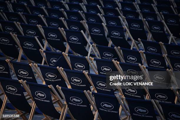 Sun loungers with the logo of the palm are set to watch movies on the beach as part of the "Cinema de la Plage" screenings during the 66th Cannes...