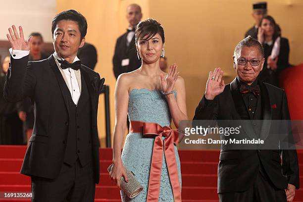 Takao Osawa, Nanako Matsushima, and Takashi Miike attend the Premiere of 'Wara No Tate' during the 66th Annual Cannes Film Festival at the Palais des...