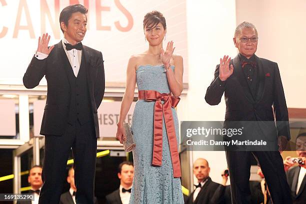 Takao Osawa, Nanako Matsushima, and Takashi Miike attend the Premiere of 'Wara No Tate' during the 66th Annual Cannes Film Festival at the Palais des...