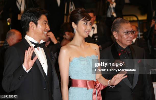 Takao Osawa, Nanako Matsushima, and Takashi Miike attend the Premiere of 'Wara No Tate' during the 66th Annual Cannes Film Festival at the Palais des...