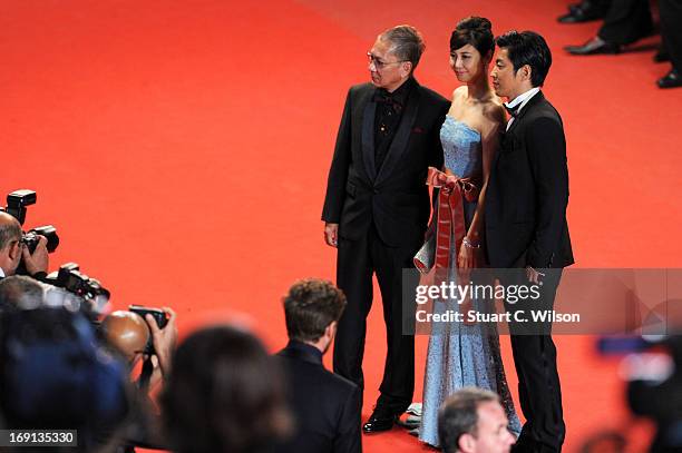 Director Takao Osawa and actors Nanako Matsushima and Takashi Miike attend the 'Wara No Tate' Premiere during the 66th Annual Cannes Film Festival at...