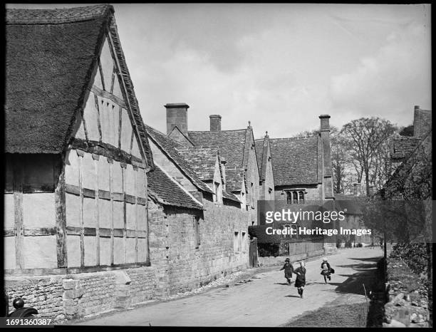 Stanway Road, Stanton, Tewkesbury, Gloucestershire, 1934. Looking north on Stanway Road towards The Manor with Old Barn and Old Dairy in the...