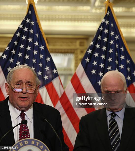 Sen. Carl Levin , Chairman of the Senate Investigations Subcommittee, and U.S. Sen. John McCain speak to reporters during a briefing on Capitol Hill,...