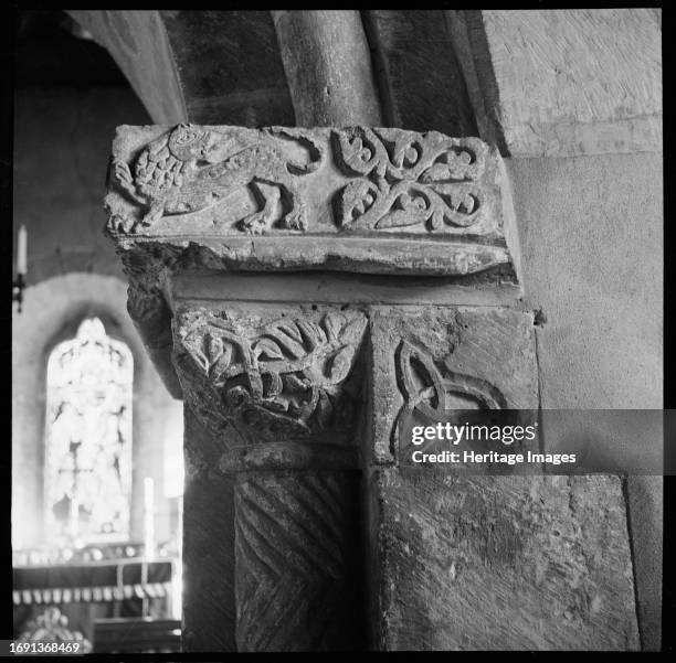 St Nicholas Church, Earls Croome, Malvern Hills, Worcestershire, circa 1938. A detail of elaborate romanesque carving on the south capital of the...