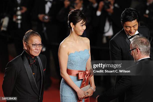 Director Takashi Miike and actors Nanako Matsushima and Takao Osawa attend the 'Wara No Tate' Premiere during the 66th Annual Cannes Film Festival at...