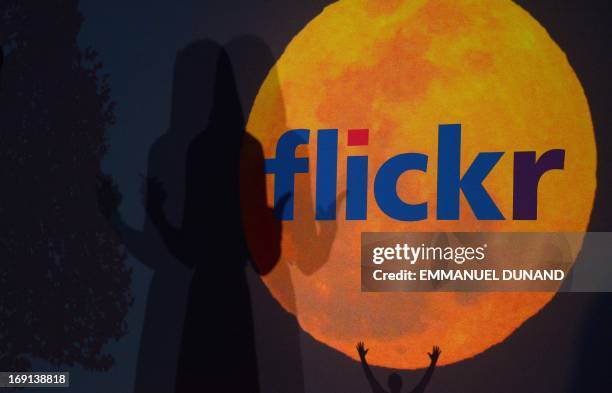 Logo for Yahoo's Flickr website is displayed during an announcement that Yahoo acquired the Tumblr blogging site in order to upgrade its Flickr site,...