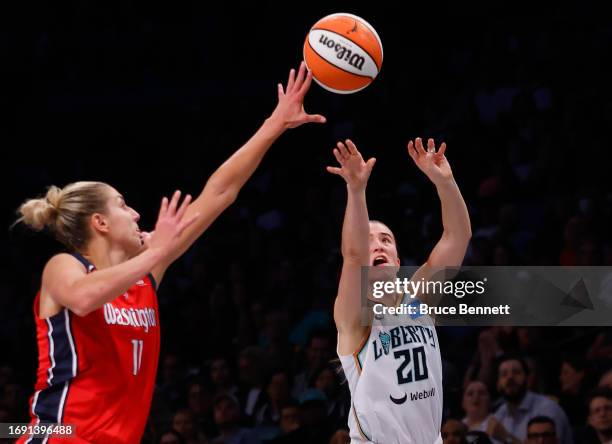 Elena Delle Donne of the Washington Mystics blocks a shot by Sabrina Ionescu of the New York Liberty during Game Two of Round One of the 2023...