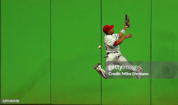 Ben Revere of the Philadelphia Phillies misses a fly ball during a game against the Miami Marlins at Marlins Park on May 20, 2013 in Miami, Florida.