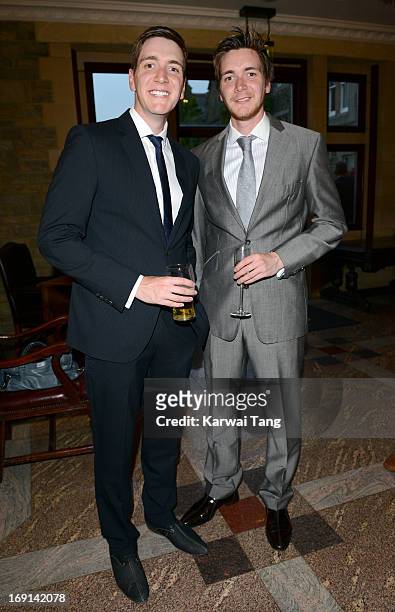 James Phelps and Oliver Phelps attend the celebrity golf classic drinks reception at the South Lodge Hotel on May 20, 2013 in Horsham, England.