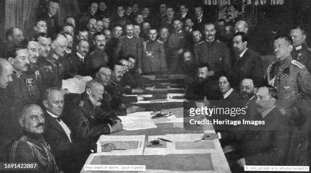 'Dissolution of the Eastern Front; Signing the armistice of Brest-Litovsk, December 15, 1917: on the left, the delegates of the central powers; on...