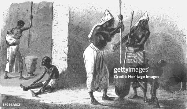 Women pounding Millet; Journey from the Senegal to the Niger', 1875. From 'Illustrated Travels' by H.W. Bates. [Cassell, Petter, and Galpin, circa...