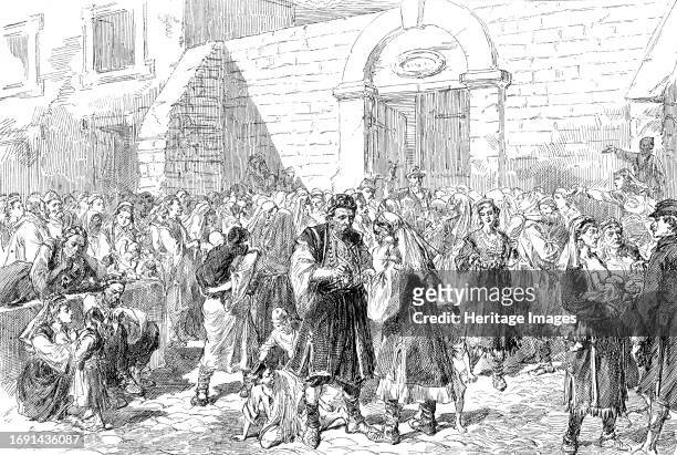 Distributing Charitable Funds to the Herzegovinian Refugees at Ragusa [Dubrovnik], from a sketch by our special artist, 1876. 'A general amnesty has...
