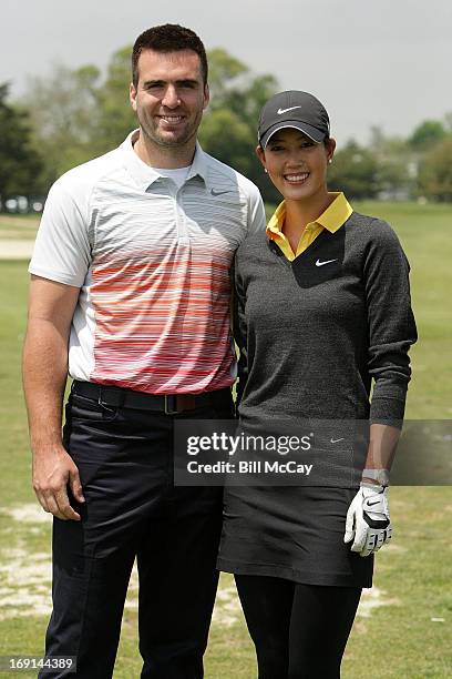 Joe Flacco, Baltimore Ravens Super Bowl XLVII MVP, and Michelle Wie, LPGA Professional, attend the Ron Jaworski's Celebrity Golf Challenge May 20,...