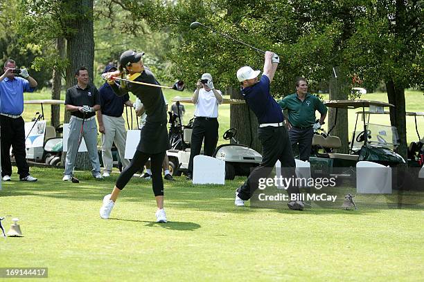 Michelle Wie, LPGA Professional, and Bobby Bradley, World Long Driver Finalist, attend the Ron Jaworski's Celebrity Golf Challenge May 20, 2013 at...