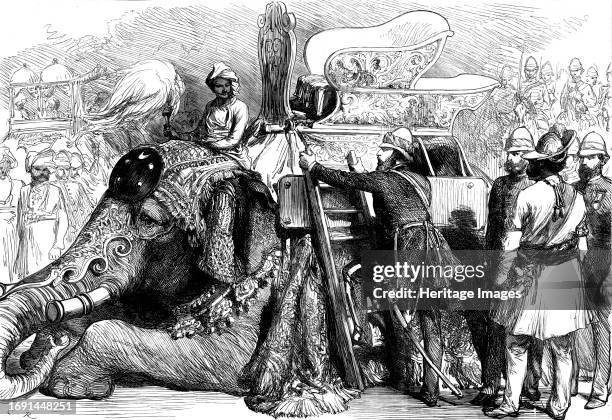 The Royal Visit to India: the Prince of Wales mounting his elephant at the Old Palace of Lushkur, Gwalior, from a sketch by one of our special...
