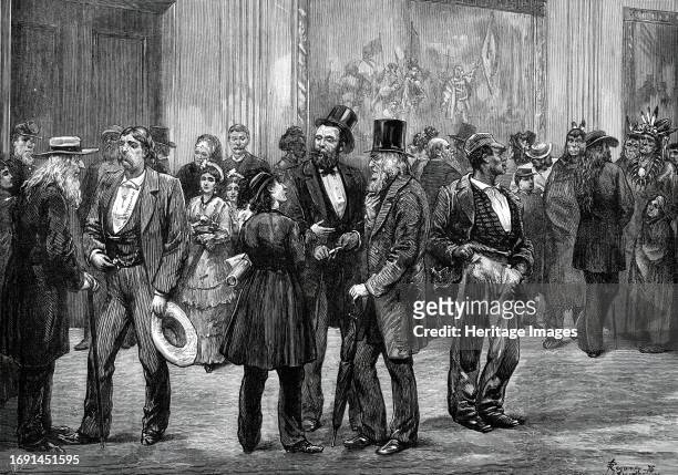 Scene in the Rotunda, Washington, 1876. '...an Illustration of the manner in which people stand about the Rotunda, "lobbying" the members of Congress...