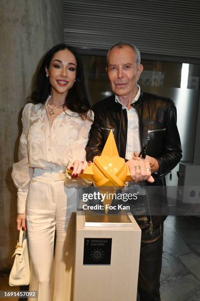 Visual artist/painter/sculptor Rita Sabo and Jean Claude Jitrois attend the "Sacred Planet for #Art4GlobalGoals By Rita Sabo" Exhibition at UNESCO on...