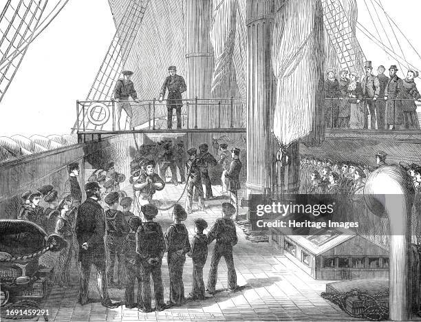Visit of the Boys of the Clyde training-ship Cumberland to H.M.S. Aurora, 1876. Engraving from a sketch by Captain Grier. 'The little fellows seemed...