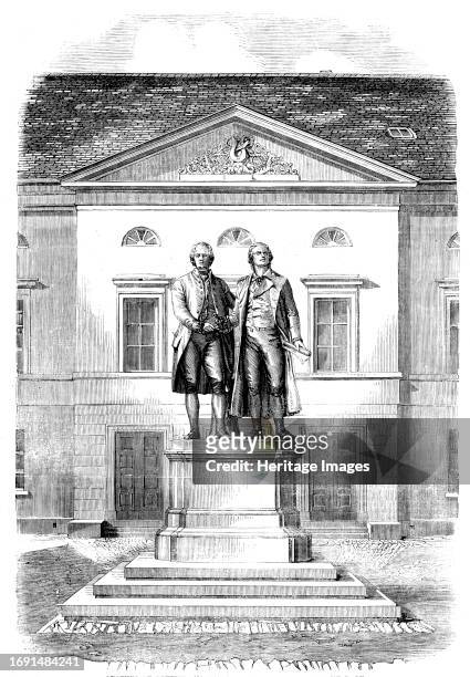 Statues of Goethe and Schiller at Weimar, 1858. Sculpture of German writers and dramatists Johann Wolfgang von Goethe and Friedrich Schiller....