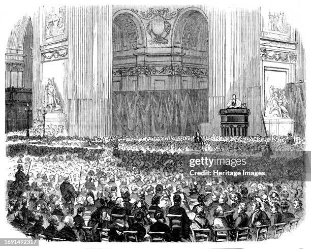 The First Evening Service at St. Paul's Cathedral, on Advent Sunday, [London], 1858. 'A circle of small jets of gas runs round the cornice [of the...