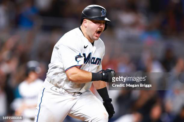 Jake Burger of the Miami Marlins reacts after hitting a walk off RBI single to defeat the New York Mets at loanDepot park on September 19, 2023 in...