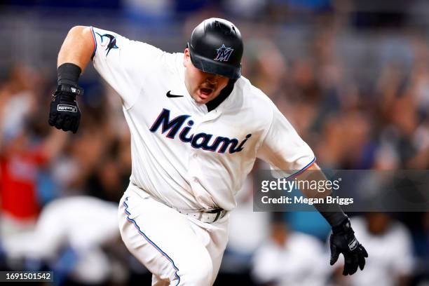 Jake Burger of the Miami Marlins reacts after hitting a walk-off RBI-single to defeat the New York Mets at loanDepot park on September 19, 2023 in...