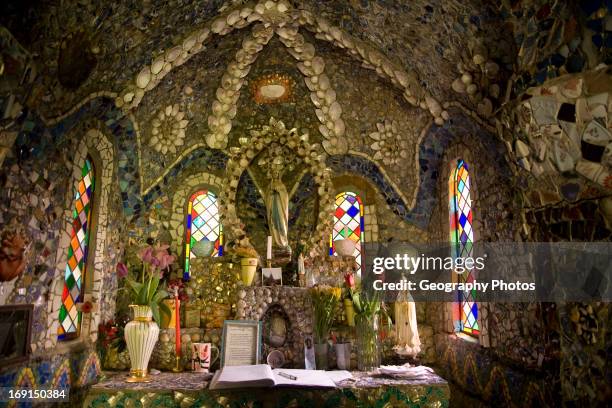 Altar, Little Chapel, Guernsey is possibly the smallest chapel in the world. . It was built out of seashells and broken pottery by Brother DÈodat who...