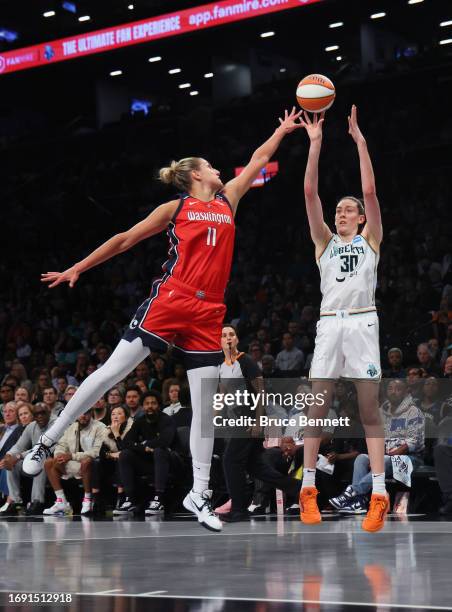 Breanna Stewart of the New York Liberty scores two against Elena Delle Donne of the Washington Mystics during Game Two of Round One of the 2023...
